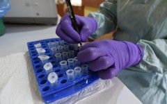 A health official works at the Lassa Fever Research and Control in Irrua Specialist Teaching Hospital in midwest Nigeria, in 2018