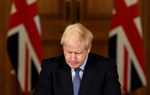 Britain's Prime Minister Boris Johnson reacts during a virtual press conference inside 10 Downing Street in central London on October 20, 2020. (AFP)