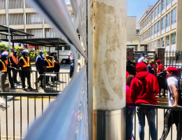 A gate separating the students and police at Wits University. 