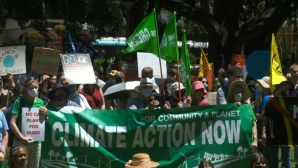 Hundreds of people rally over climate change in Sydney