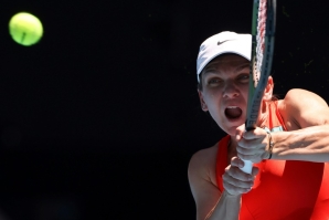 Simona Halep hits a return on her way to the last 16 of the Australian Open with a 6-2, 6-1 demolition of Danka Kovinic