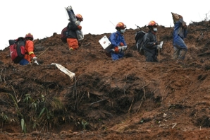 Hundreds of people, including firefighters, doctors and investigators, remain at the scene of the tragedy recovering human remains and the wreckage of the plane