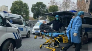 Ambulances transporting patients arrive at Shanghai hospital