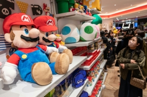 Nintendo trimmed the annual hardware sales forecast for its Switch console to 18 million units