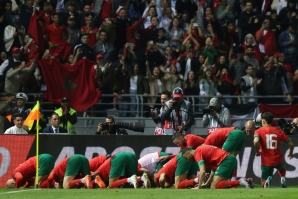Celebration: Morocco's players after  their second goal 