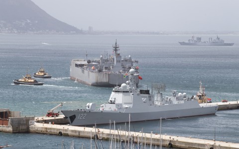 A general view of (L-R) the Chinese guided-missile destroyer Tangshan (Hull 122), the Iranian navy ship, the IRIS Makran 441, Chinese comprehensive supply ship Taihu (Hull 889) in the Simon's Town harbour, near Cape Town, on January 8, 2026.