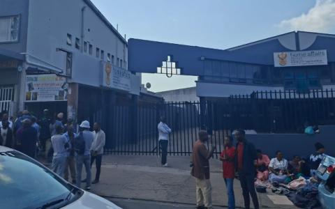 Foreign nationals outside Durban's Home Affairs offices