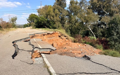 Sinkholes linked to illegal mining are swallowing whole roads, damaging infrastructure and threatening lives.