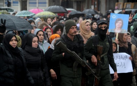 Kurds rallied in Qamishli against a Syrian government advance before the announcement of a truce deal that many now see as a betrayal of their aspirations