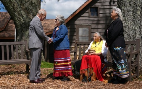 Britain's King Charles III speaks with members of the Monacan Indian Nation during a visit to Shenandoah National Park, in the US state of Virginia