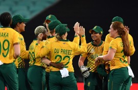 File: South Africa's players celebrate the dismissal of Australia's Jess Jonassen during the Twenty20 women's World Cup semi-final cricket match between Australia and South Africa in Sydney on March 5, 2020.