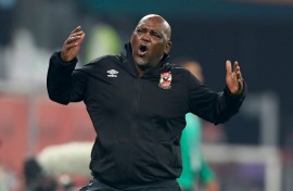 Pitso Mosimane reacts during the FIFA Club World Cup second round football match between Qatar's Duhail and Egypt's Al-Ahly at the Education City Stadium in the Qatari city of Ar-Rayyan on February 4, 2021.