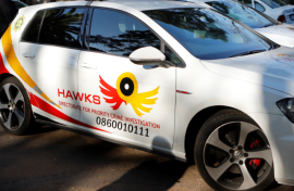 File: The Hawks arrested nine suspects in relation to corruption in the Nelson Mandela Bay Municipality. The suspects include government officials as well as businessmen. (AFP)