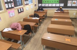 Pupils in a classroom practicing social distancing - Cape Town.