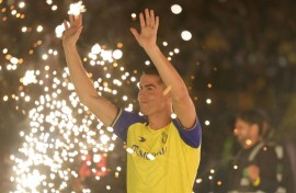 Al-Nassr's new Portuguese forward Cristiano Ronaldo greets fans during his unveiling at the Mrsool Park Stadium in Riyadh