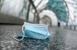 File: A face mask lying on the ground.
