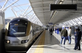 File: Passengers wait to get on the Gautrain in Pretoria. 