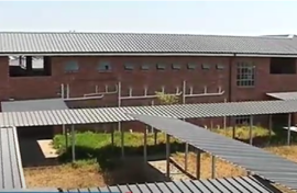 An R82-million school in Tembisa is standing empty while pupils are taught in containers. The Infrastructure Development Department hasn't been able to get a certificate of occupancy because the school was built in a waterlogged area. 