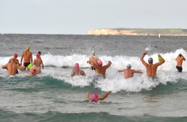 Beachgoers enjoy their first swim after Bondi Beach reopened following a five-week closure in Sydney.
