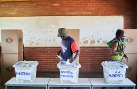 A man casts his vote at a polling station during Zimbabwe's presidential and legislative elections. AFP/Zinyange Auntony