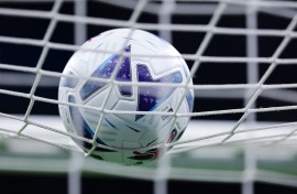 File: A soccer ball hitting a net. AFP/Fabrizio Carabelli/LiveMedia/NurPhoto