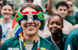 A springbok supporter wears glasses with the South African National Flag on them during the Springboks Champions trophy tour in Durban, on November 4, 2023, after South Africa won the France 2023 Rugby World Cup final match against New Zealand.
