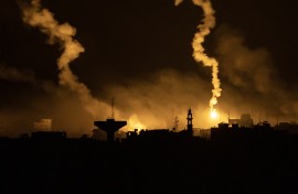 This picture taken from a position near Sderot along the Israeli border with the Gaza Strip early on November 13, 2023, shows flares dropped by Israeli forces above the Palestinian enclave amid ongoing battles between Israel and the Palestinian Hamas movement.