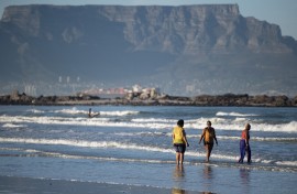 A view of Table Mountain, across Table Bay, from Bloubergstrand Beach, in Cape Town. 
