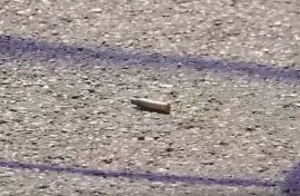 A shell casing at the scene of the Rustenburg shooting.
