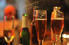 File: Glasses with alcohol on the counter of a bar. Frank May/dpa Picture-Alliance via AFP