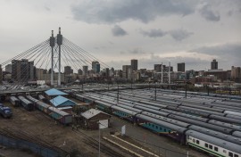 File: An aerial view in Johannesburg shows the Mandela bridge in Braamfontein and the Park Station train depot.