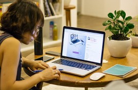 File: A woman working behind a computer. Employment equity. Wikimedia Commons/Pxhere