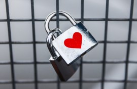 A love padlock is seen at Father Bernatek Footbridge over Vistula River, which is known as the lovers bridge. Krakow, Poland on February 13, 2023. (Photo by Beata Zawrzel/NurPhoto) (Photo by Beata Zawrzel / NurPhoto / NurPhoto via AFP)