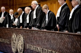 The judges including President Joan Donoghue (M) during the ruling of the International Court of Justice (ICJ) in the genocide case of Ukraine against Russia. Sem van der Wal/ANP via AFP