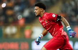 South Africa's goalkeeper #1 Ronwen Williams celebrates after winning at the end of the Africa Cup of Nations (CAN) 2024 quarter-final football match between Cape Verde and South Africa at the Stade Charles Konan Banny in Yamoussoukro on February 3, 2024. 
