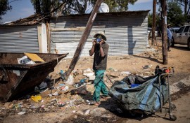 File: A waste picker seen in Diepsloot. AFP/Michele Spatari