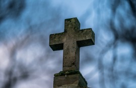 File: Detail of a catholic cross on a grave in the cemetery. Xose Bouzas/Hans Lucas via AFP