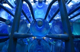 Bottled drinking water being delivered to supermarkets. AFP/Dante Fernandez