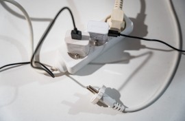 File: Multiple plugs in an electrical outlet. AFP/Jean-Marc Barrere/Hans Lucas