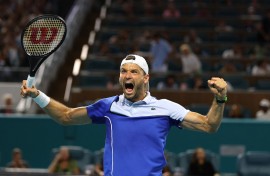 Grigor Dimitrov of Bulgaria celebrates after defeating Carlos Alcaraz of Spain. AFP/Al Bello/Getty Images