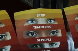 A sign urging people to stop human trafficking.