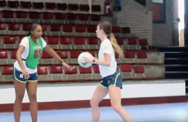 The netball players practicing.