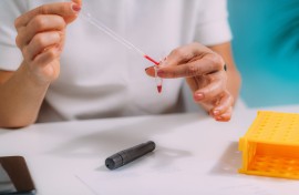 File: Measuring blood glucose levels, conceptual image.
