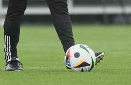 File: A soccer player practicing with a ball. AFP/Bruno Fahy/Belga Mag