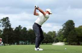 Rory McIlroy of Northern Ireland plays his shot from the first tee during a practice round prior to the 2024 Masters Tournament at Augusta National Golf Club on April 10, 2024 in Augusta, Georgia.