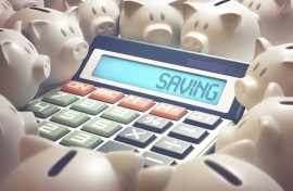 File: An illustration of a calculator with the word saving and piggy banks. KTS/Science Photo Library via AFP