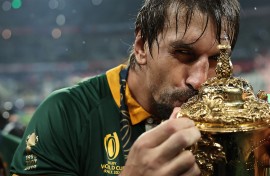 Eben Etzebeth kisses the Webb Ellis Cup as South Africa's players celebrate winning the France 2023 Rugby World Cup final match against New Zealand. AFP/Franck Fife