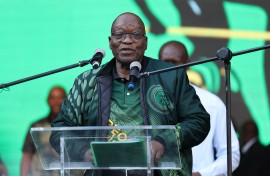 Former president Jacob Zuma addresses supporters at Orlando Stadium in Soweto. AFP/Phill Magakoe