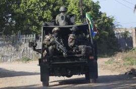 File: A military convoy of South Africa National Defence Forces (SANDF) soldiers. AFP/Alfredo Zuniga