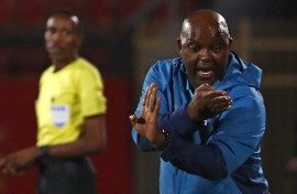 File:  Pitso Mosimane reacts during the CAF Champions League semi-final match between Egypt's al-Ahly and Algeria's ES Setif at the al-Salam stadium in Cairo on May 7, 2022.